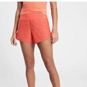 NWT Athleta Run With it shorts Space Dye Orange Haze color